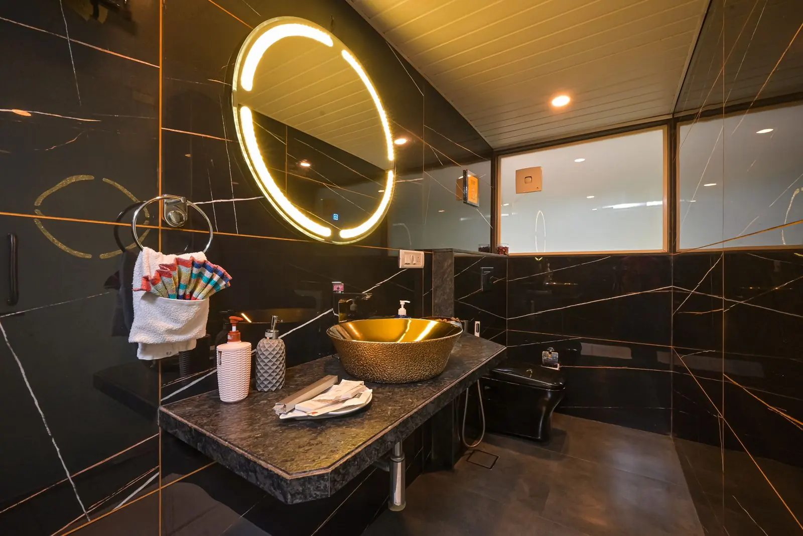 Ensuite bathroom in dark marble — Carpe Diem, Lonavala