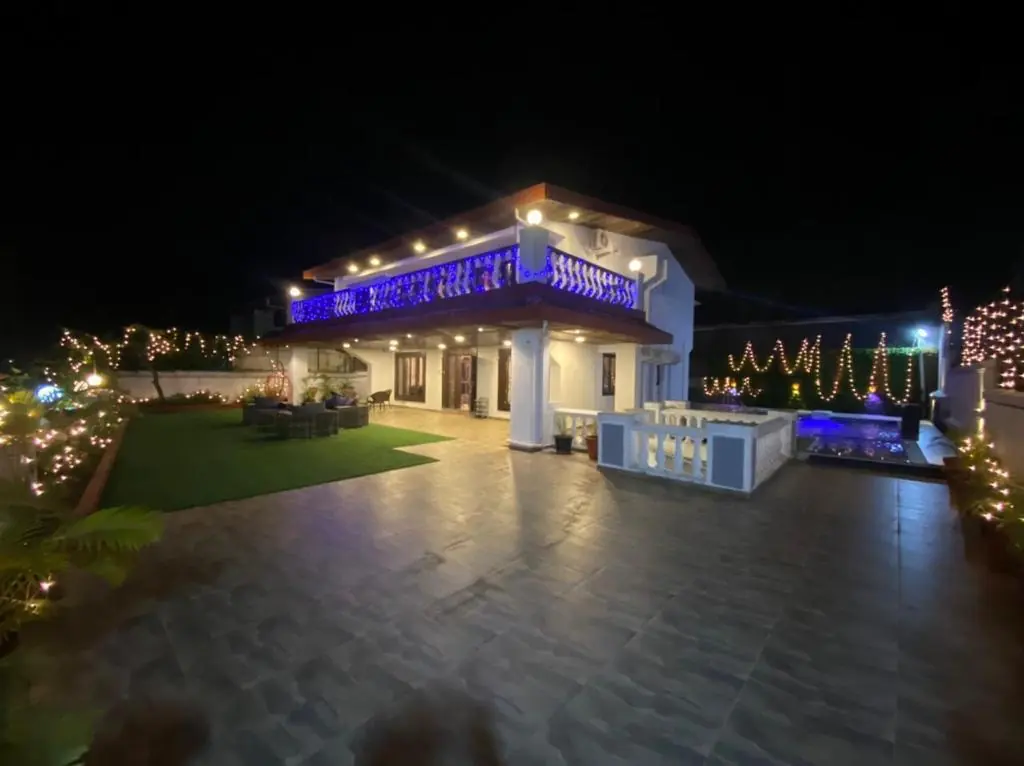 The villa lit up in the evening — Carpe Diem, Lonavala