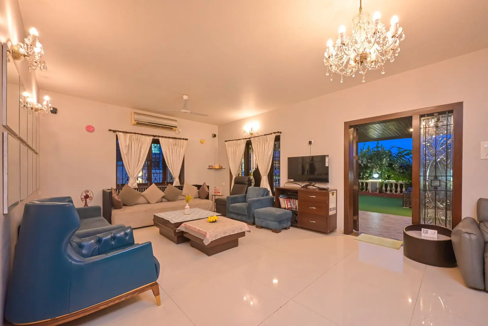 The chandelier-lit living room — Carpe Diem, Lonavala