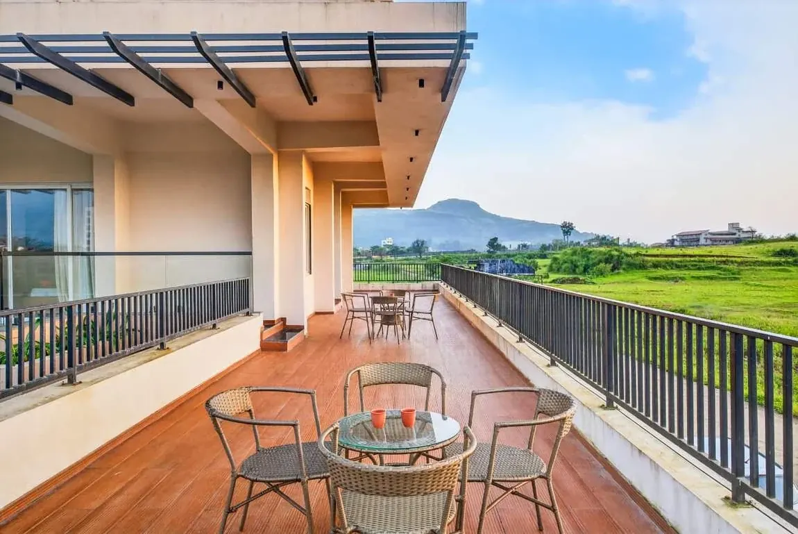 Balcony looking across the farms to the hills — Greenwood Villa, Igatpuri