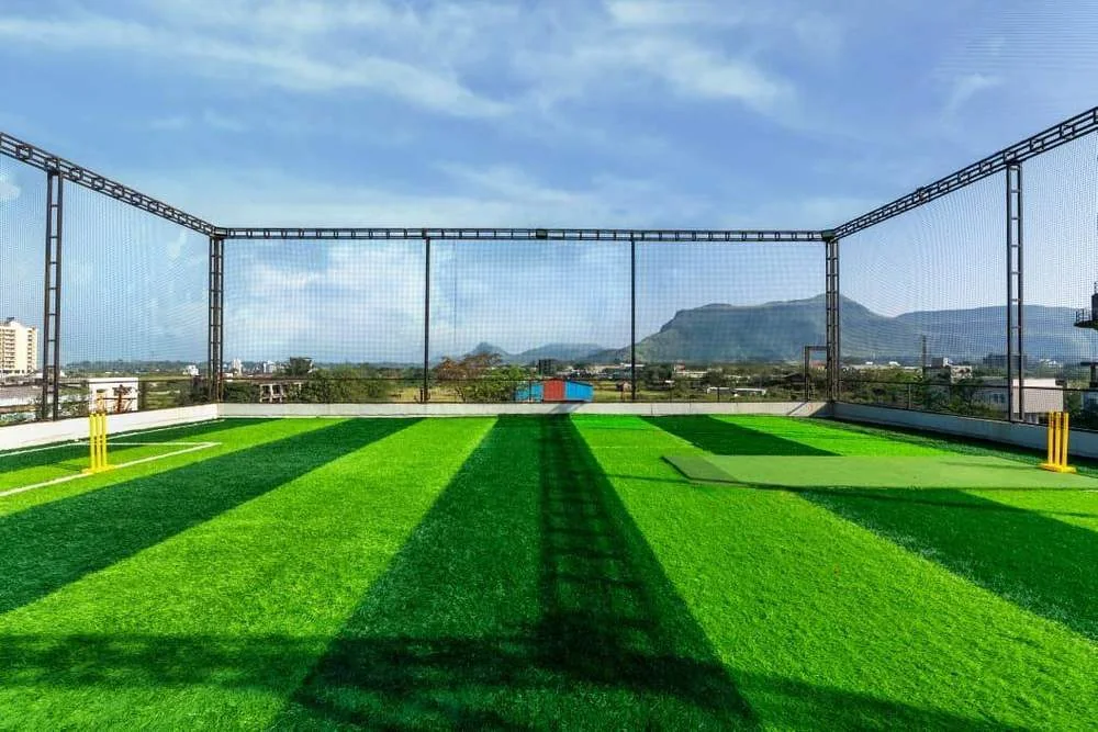 Cricket turf with Sahyadri hill views at Greenwood Villa, Igatpuri
