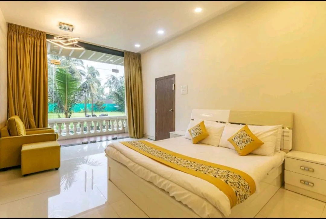 Second king bedroom with garden view — Heritage Villa, Nagaon Alibaug