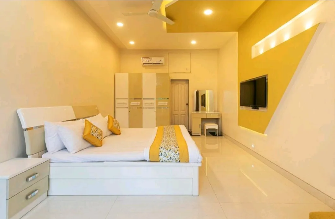 Bedroom with wardrobe and TV — Heritage Villa, Nagaon Alibaug