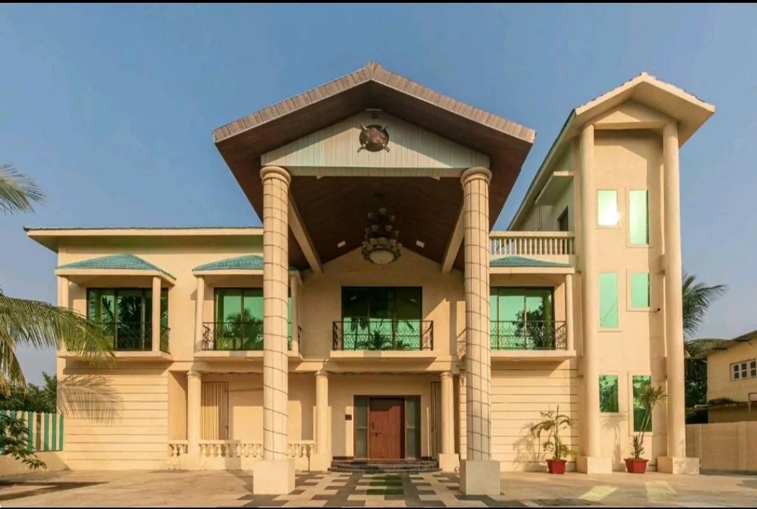 Wood-panelled bedroom — Heritage Villa, Nagaon Alibaug