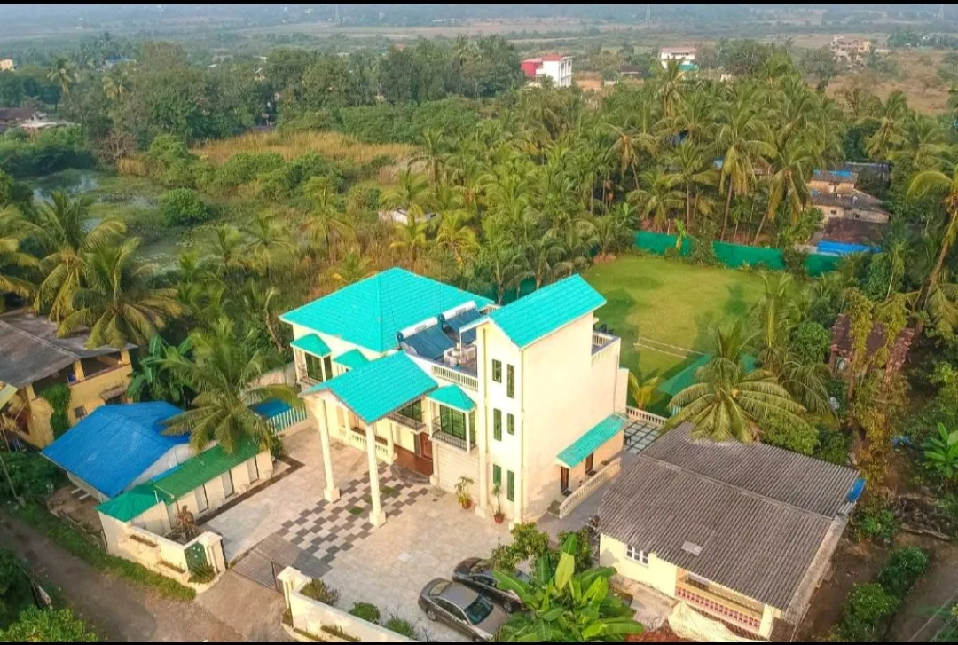 Lawn seating with the villa behind — Heritage Villa, Nagaon Alibaug