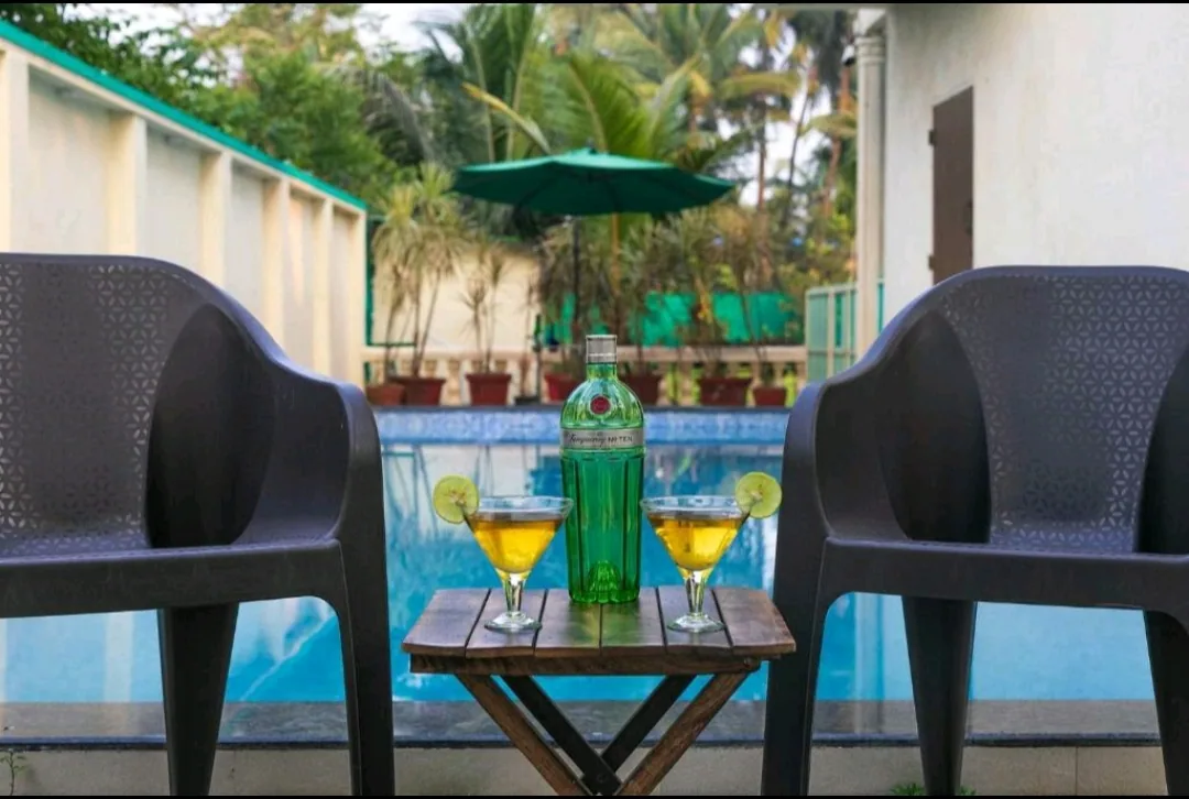 Poolside seating — Heritage Villa, Nagaon Alibaug