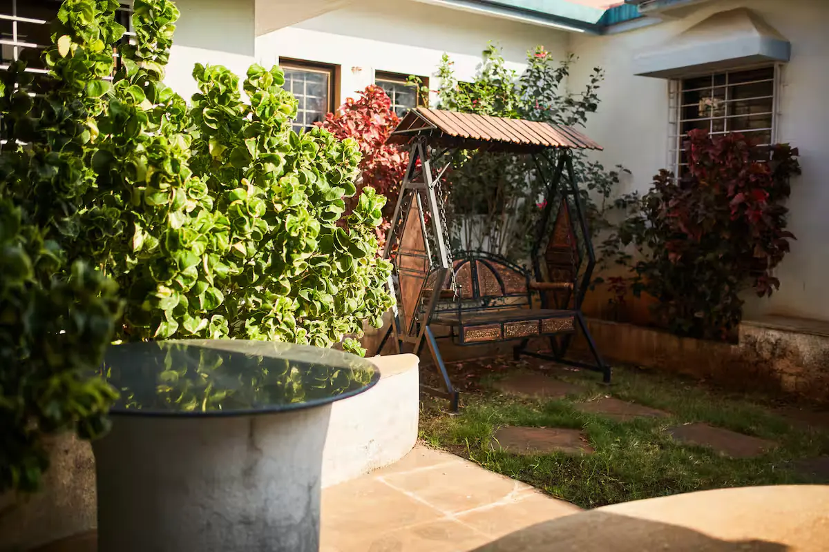 Garden swing & outdoor seating — Madhavi's Villa, Lonavala