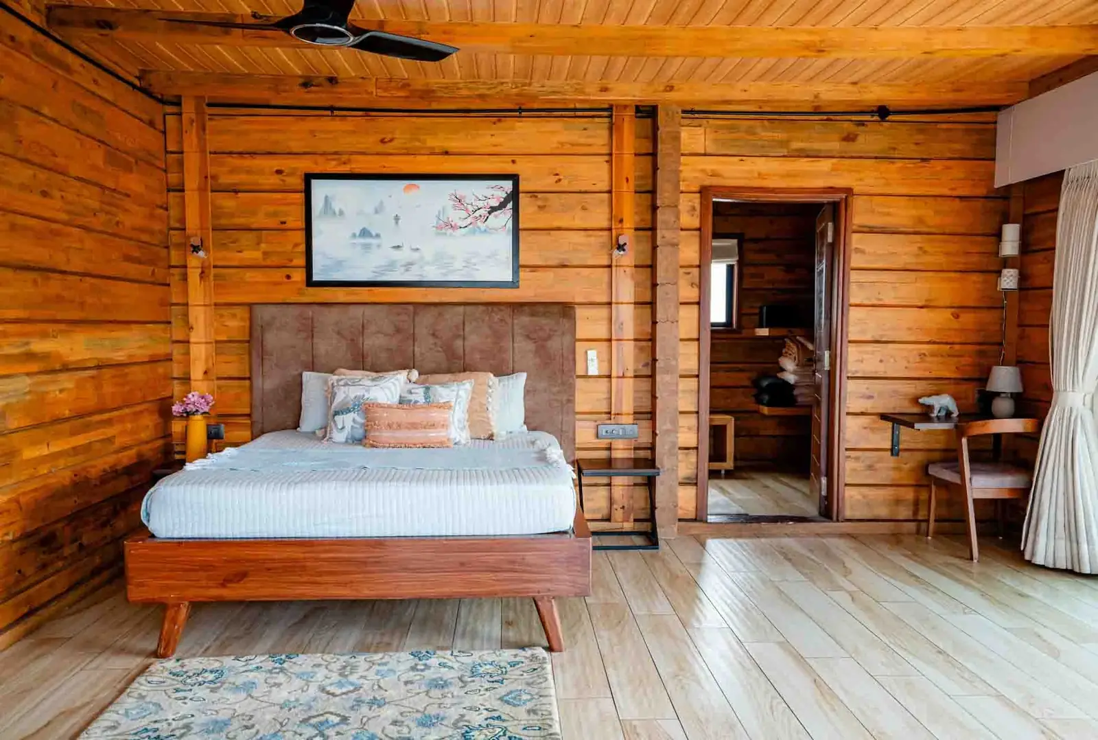Bedroom with en-suite bathroom and work desk — Mantra 147, Pawna Lake, Lonavala