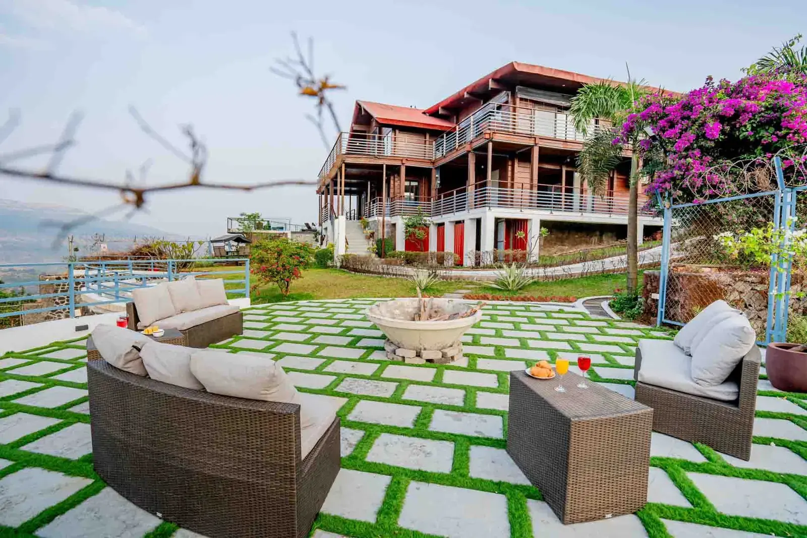 Fire-pit lounge on the lower lawn — Mantra 147, Pawna Lake, Lonavala
