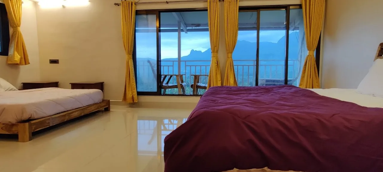 Bedroom 3 — two kings, opening onto a sitout with the valley view — Misty Cascades, Karjat