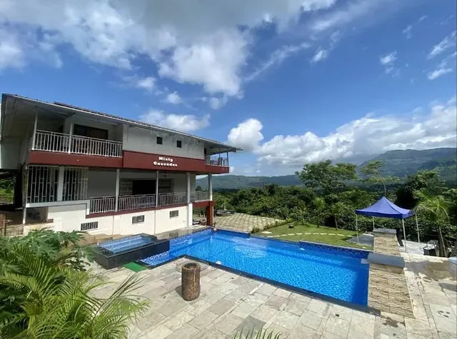 The house and pool on a clear day — Misty Cascades, Karjat