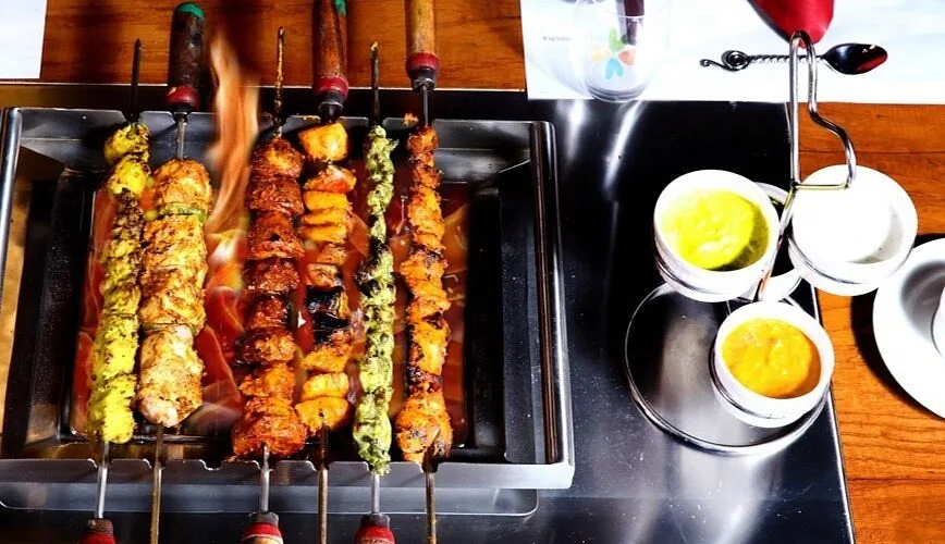Kebabs on the barbeque — arranged at additional cost — Misty Cascades, Karjat