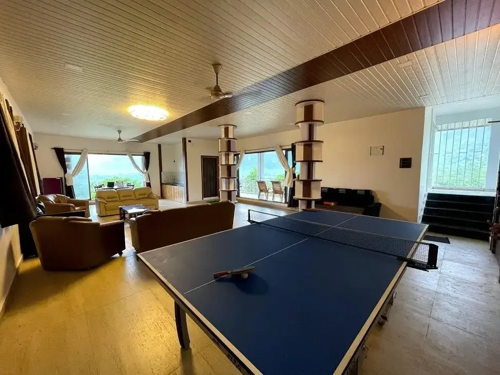 Table tennis in the main hall — Misty Cascades, Karjat