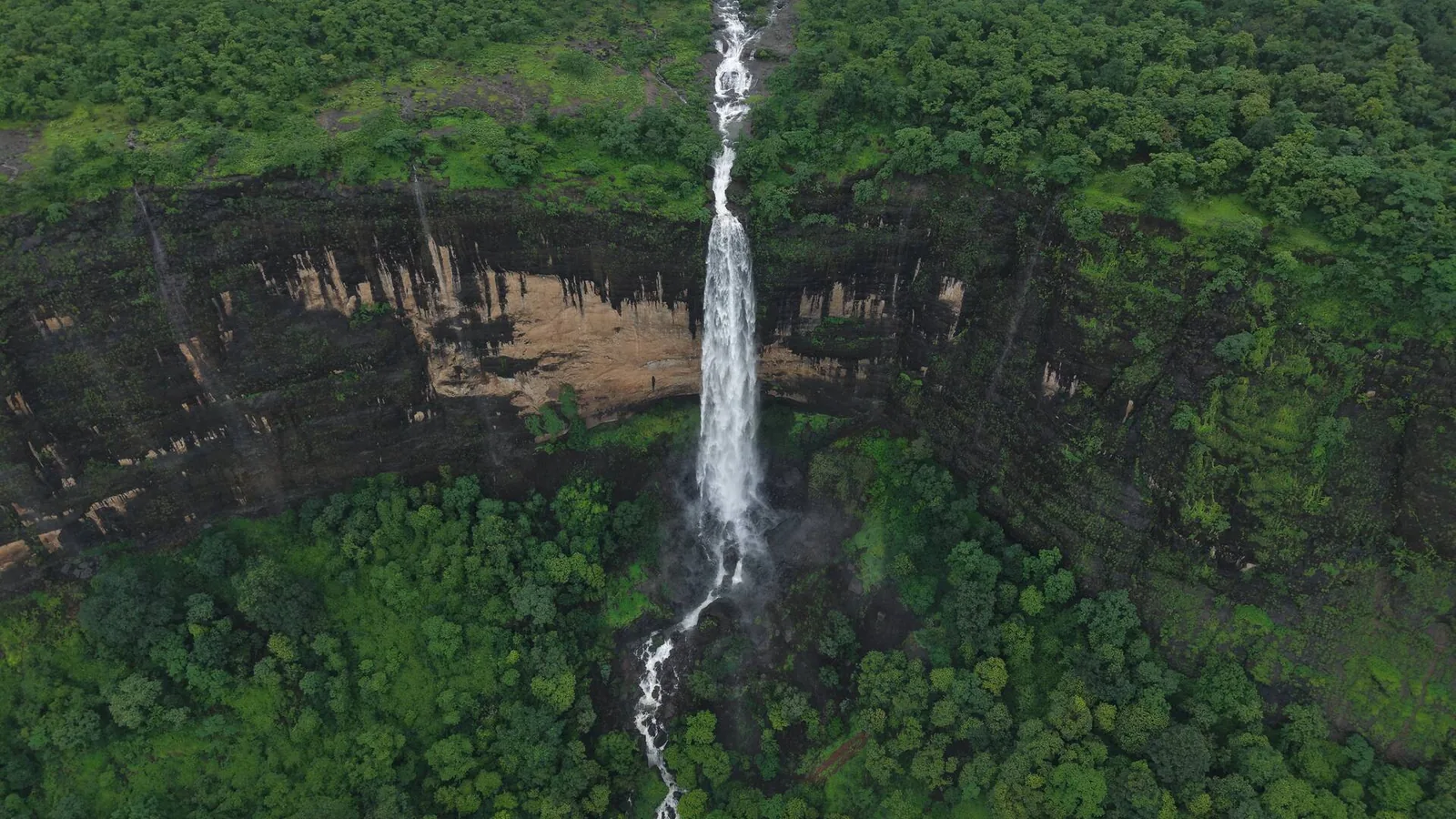 The main waterfall near the villa, seen from above — Misty Cascades, Karjat